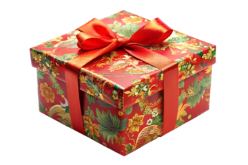 Photo of a festive red gift box with a golden floral pattern, tied with a red ribbon and bow, isolated on a transparent background
