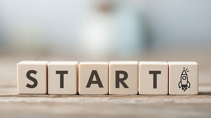 Wooden blocks spelling "START" with a colorful rocket launching beside them. Concept of beginning, motivation, or startup in business or personal growth