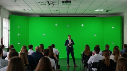 Business conference presentation in front of a green screen with audience, great for background replacement and event marketing - Powered by Adobe