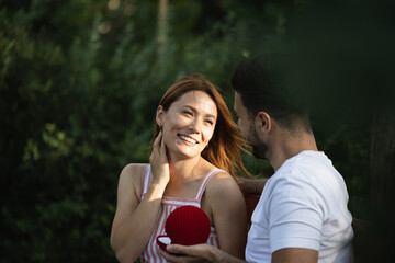 Woman saying yes to a man proposing to her