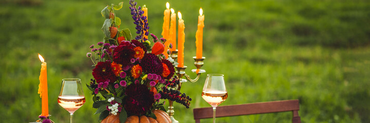 Banner. Fall table decoration with pumpkin composition. Family cozy thanksgiving dinner arrangement...