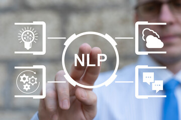 Business person using virtual touch screen push text: NLP. NLP Natural Language Processing AI Artificial intelligence or Neuro Linguistic Programming Concept. 