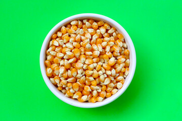 Yellow raw unpopped popcorn kernels