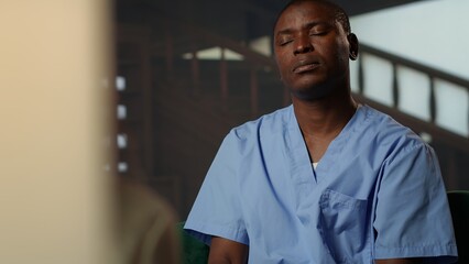 Psychotherapist assists man nurse to deal with patients complications, therapy and psychological...