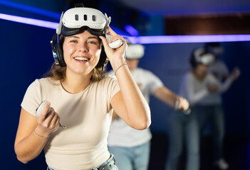 Heated female player raised helmet to forehead and suspended participation in friendly match, game...