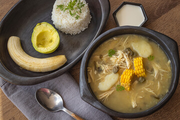 Traditional Colombian Ajiaco with Rice, Avocado and Arepa