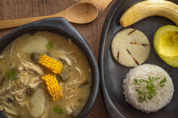 Traditional Colombian Ajiaco with Rice, Avocado and Arepa