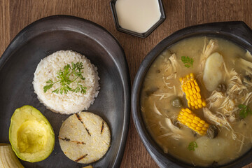 Traditional Colombian Ajiaco with Rice, Avocado and Arepa