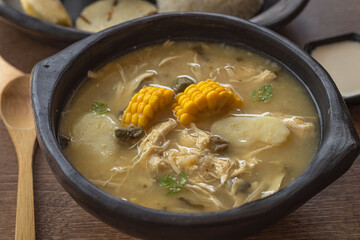 Traditional Colombian Ajiaco with Rice, Avocado and Arepa