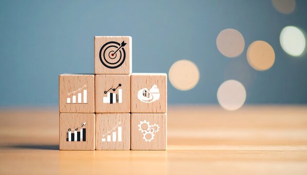 Wooden blocks with business icons