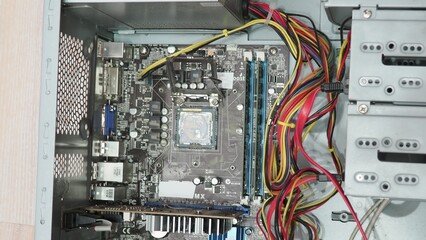 technician hold the screwdriver for repairing the laptop. computer hardware, repairing, upgrade and...