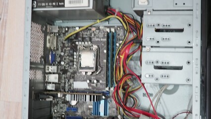 technician hold the screwdriver for repairing the laptop. computer hardware, repairing, upgrade and...