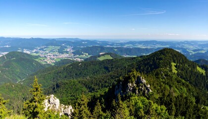 Obraz premium Mountain vista, valleys, and city