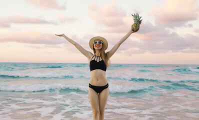 Summer vacation, beautiful happy woman in swimsuit enjoying sunset landscape on the beach on sea