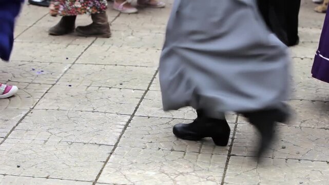 Boy Performing Traditional Zapateo in Gaucho Outfit - Low Angle View