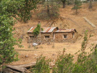 Abandoned stone house in mountains