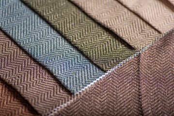 Detailed View of Herringbone Fabric Samples Multi Color Zigzag Pattern Upholstery Textiles