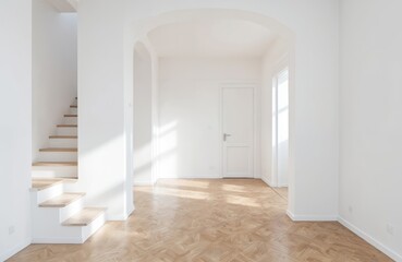 Obraz premium Bright unfurnished home interior featuring white walls, warm parquet floor. Natural light streams through windows, casting geometric shadows. Modern staircase with wooden steps leads upwards. Clean,