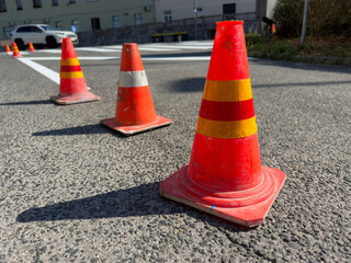 Road Marking Process with Traffic Cones on Asphalt Surface