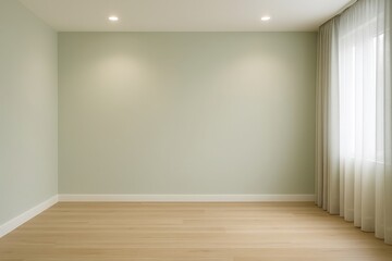 Empty room with light green walls wooden floor and sheer curtains covering a bright window