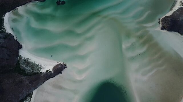 Whale Tale Baja Sur Clip 10Drone view of the iconic Balandra Beach in La Paz, featuring crystal-clear turquoise water, white sand, and one of Baja California Sur&rsquo;s most breathtaking coastal landscapes