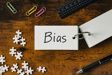 There is word card with the word Bias. It is as an eye-catching image.