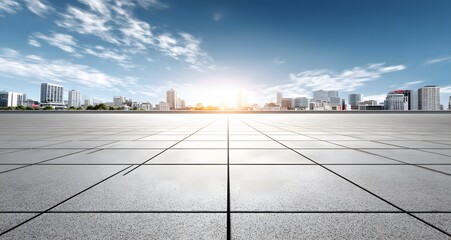 Fototapeta premium Empty paved plaza stretching to a city skyline.