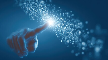 A hand's fingertip points towards a glowing, particle-like energy burst in a deep blue background