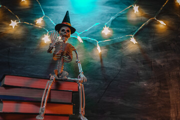 Halloween Stories.Halloween books.Book set, decorative skeleton on chalkboard background. Skeleton...