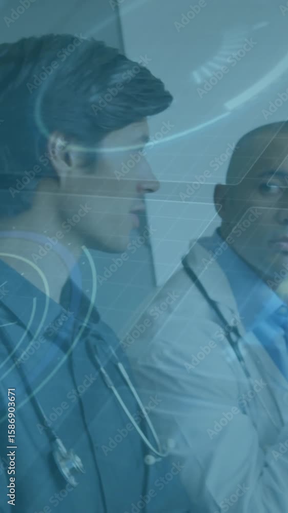 Poster discussing data and graphs, medical professionals using digital interface in hospital