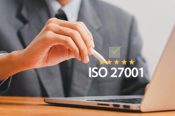 ISO 27001 concept. Businessman choose ISO 27001 for information security management system (ISMS)....