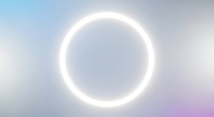 A luminous white ring glows brightly, creating a modern and minimalist design element perfect for abstract backgrounds, technology visuals, or futuristic concepts with its clean circular shape.