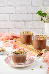 Three glasses of rich chocolate pudding