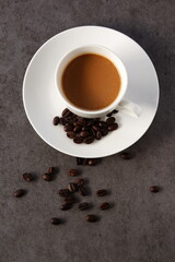 Cup of Coffee with Coffee Beans
