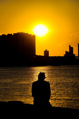 Campos dos Goytacazes, RJ, Brazil, 07/16/2025 - Sunset on the banks of the Paraíba do Sul River, in the center of Campos dos Goytacazes, in northern Rio de Janeiro state