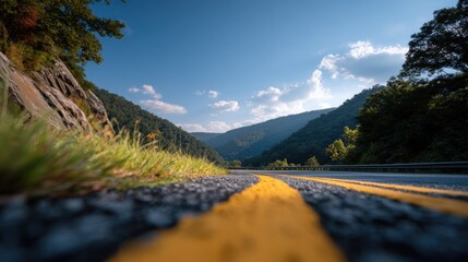 Winding Highway in High Resolution with Mountains and Blue Sky
