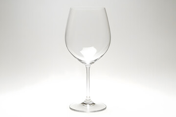 a wine glass with a white background
