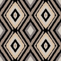 A seamless ikat pattern. Seamless folk fabric patterns combine geometric shapes and tribal patterns, suitable for making curtains, blankets, tiles, clothing pattern, phone case, and home decorations.