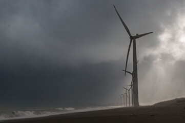 Windmills during a stormy day