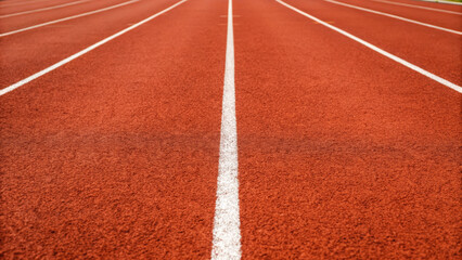 Fototapeta premium Hurdle outdoor activity. Running track lane outdoor sport competition red athletic fitness exercise stadium motivation energy focus training