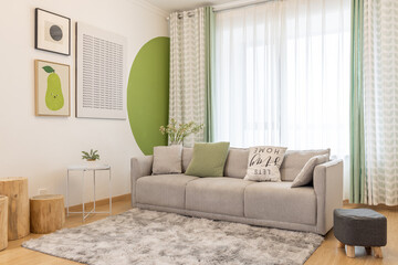 Modern and cozy living room with light color scheme