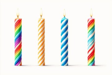 Four colorful spiral birthday candles, lit