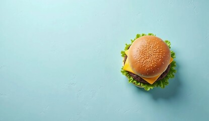 Top view of a hamburger sprinkled with sesame seeds isolated on a minimalist blue background, copy space. AI generated