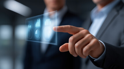 Business professionals reviewing transparent touchscreen financial data in a sleek corporate environment, emphasizing digital transformation, teamwork, analytics, and technology in modern environment