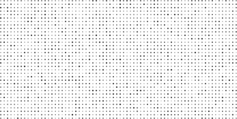 Abstract monochrome dot pattern repeating across a white background illustrating digital data structure for modern design