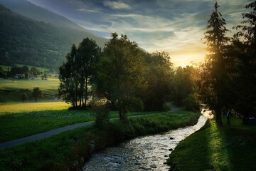 Scenic View of Lush Green Hills Under a Clear Blue Sky