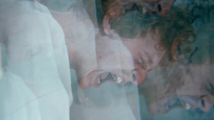 Overwhelmed male patient screaming in anguish during mental breakdown in psychiatric hospital ward. Kaleidoscope effect