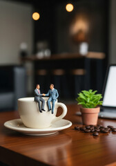 Business meeting in a coffee shop. Miniature People