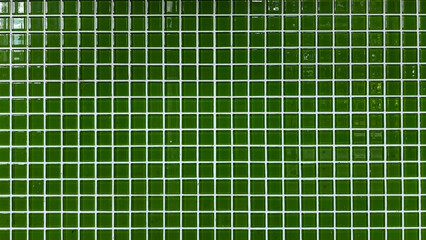 Green mosaic tile wall with glossy surface