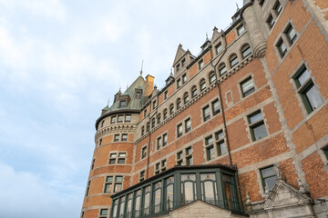 Iconic castle-like architecture of Château Frontenac with copper roofs and brick facade.